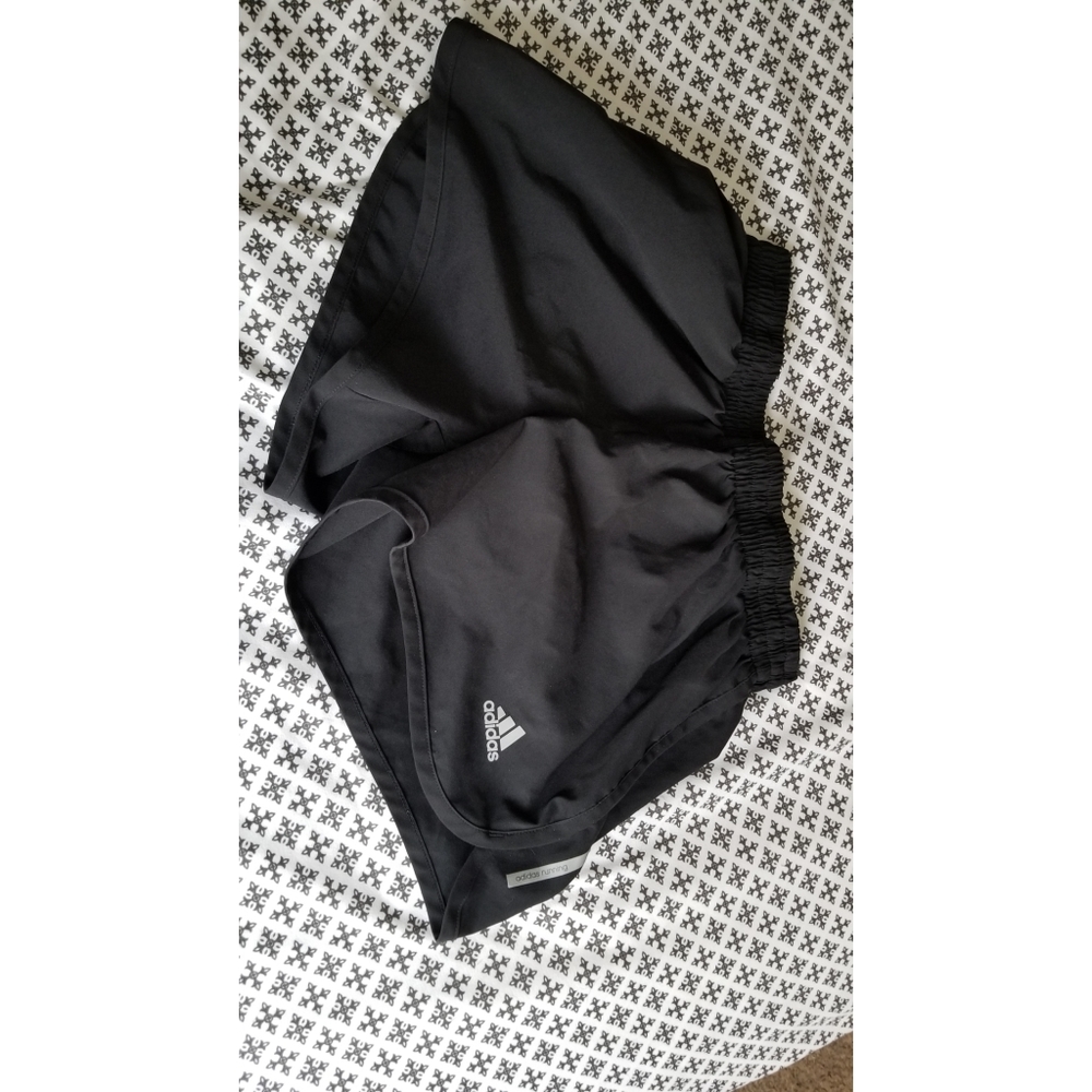 Adidas running shorts.